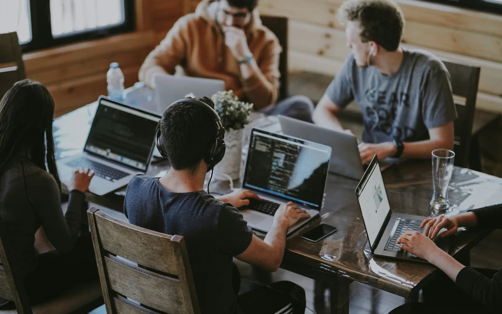 A collaborative team working together around a table