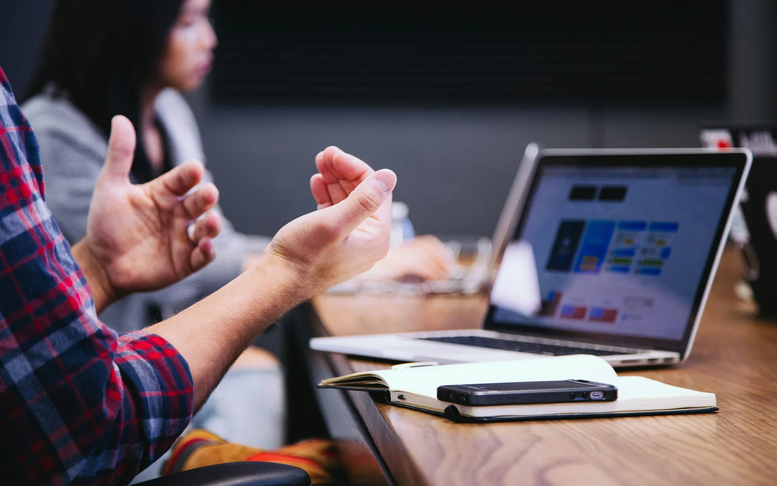 Professionals in a focused dispute-resolution meeting
